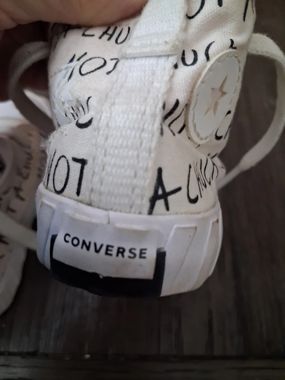 Converse Kids White Canvas High-Tops with Orange Interior and Black Script